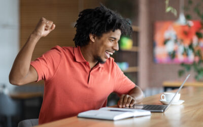 good news emotional black man looking at laptop s 2022 12 16 09 07 25 utc Recipe For Success with SAP S/4HANA